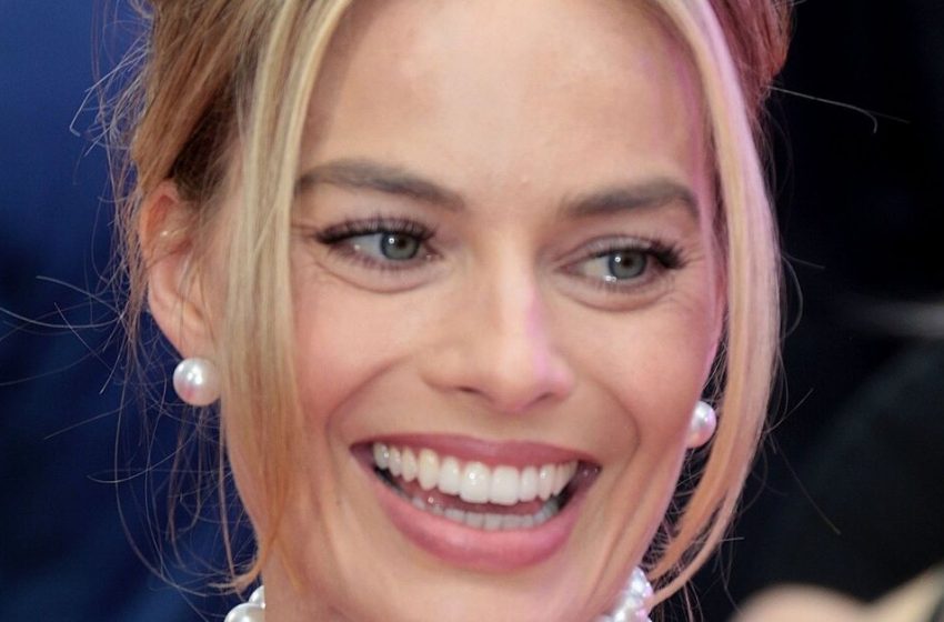  Margot Robbie appeared on the cover of the glossy in shiny stone knickers and an airy outfit